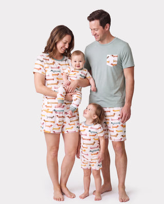 Bamboo matching family pajama set in a dog print, labelled snug-fitting for the children's sizes