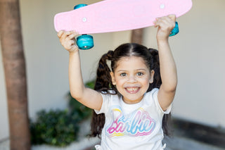 Barbie gift ideas guide showing colorful pink themed presents for kids