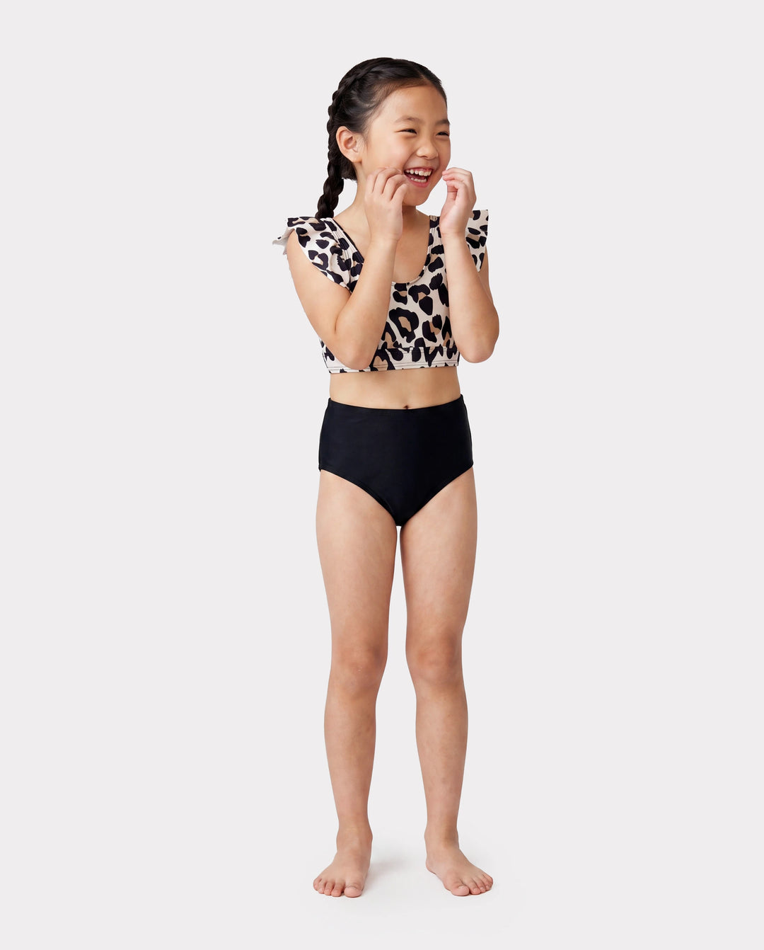 Bikini de dos piezas con falda para niña pequeña con estampado de leopardo, cuello con volantes y cordón negro