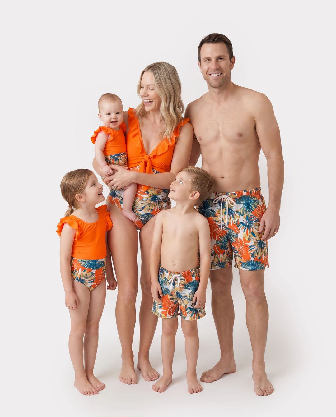 Family Matching Orange and All Over Tropical Plant Print Splicing Ruffle One-Piece Swimsuit and Swim Trunks Shorts Orange color
