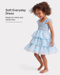 Vestido azul sin mangas con volantes y estampado floral para niña pequeña