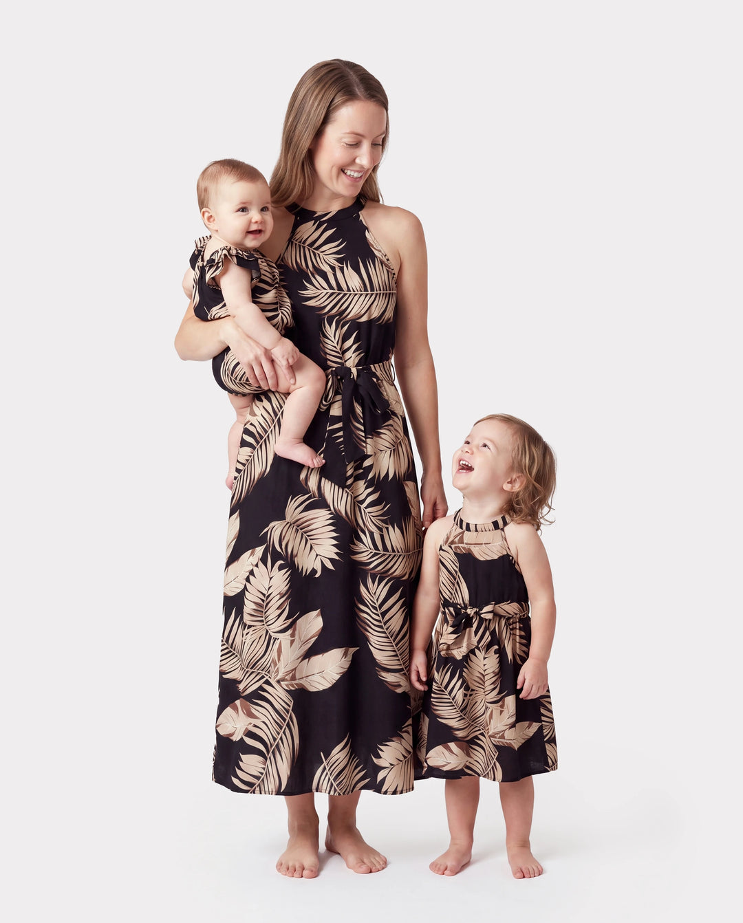 Mommy and Me Family Matching Solid Leaf Sleeveless Halter Dresses And Short Sleeve Tops Sets Black