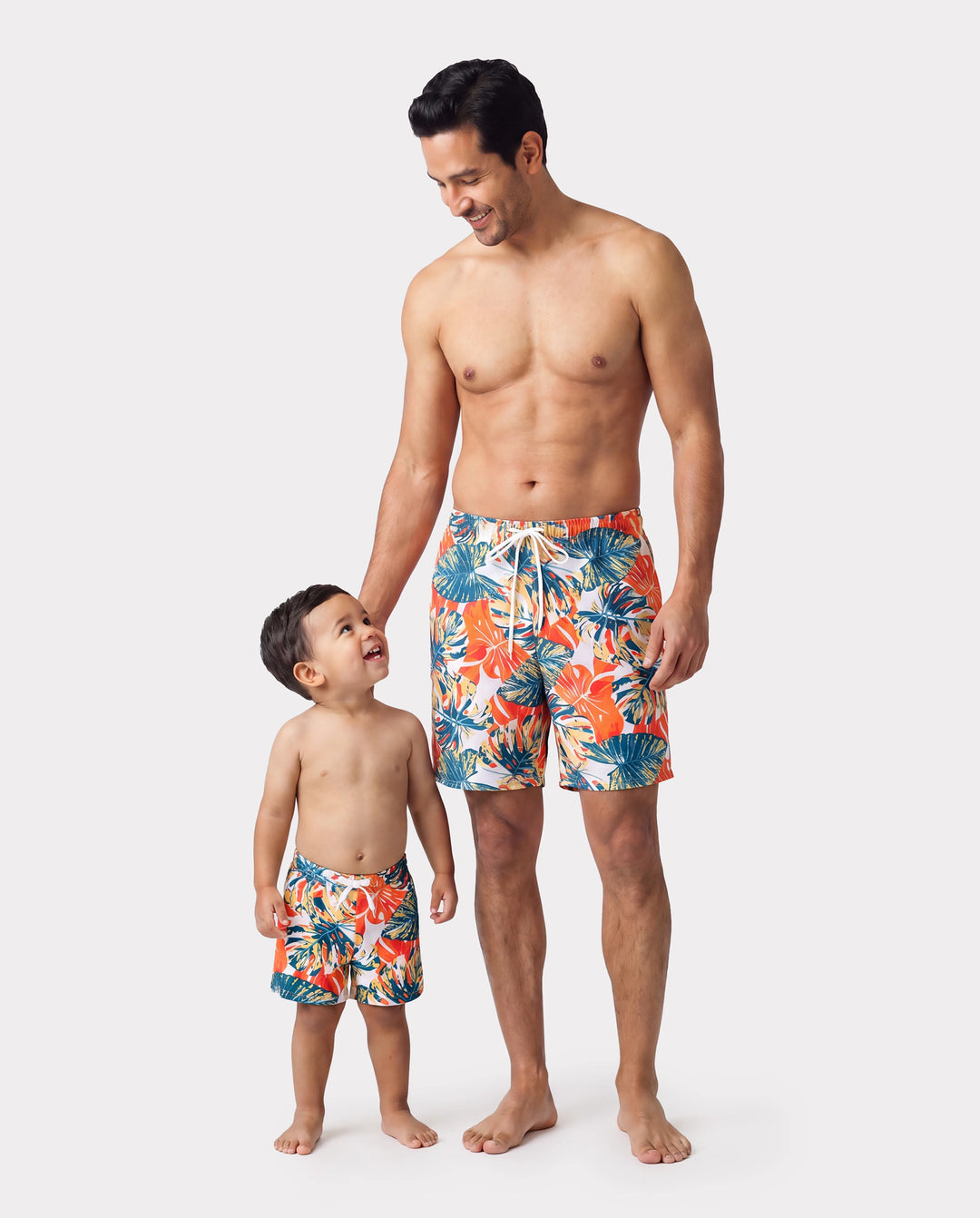 Daddy & Daughter Orange and All Over Tropical Plant Print Splicing Ruffle One-Piece Swimsuit and Swim Trunks Shorts Orange color