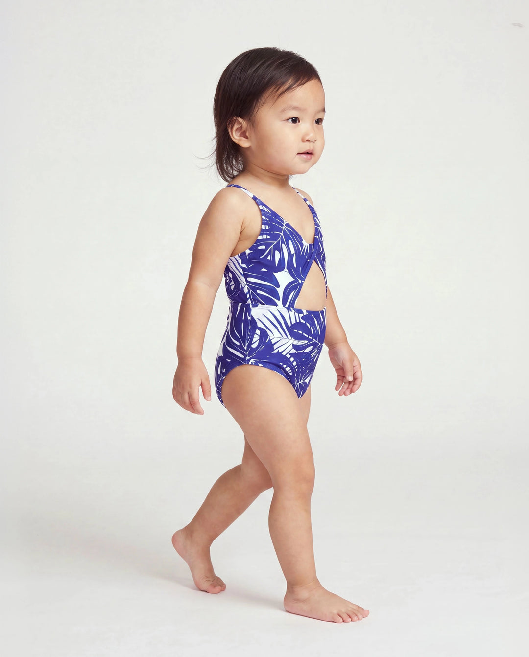 Bañador de una pieza para niña pequeña con estampado de hojas tropicales, tirantes cruzados y recorte Azul