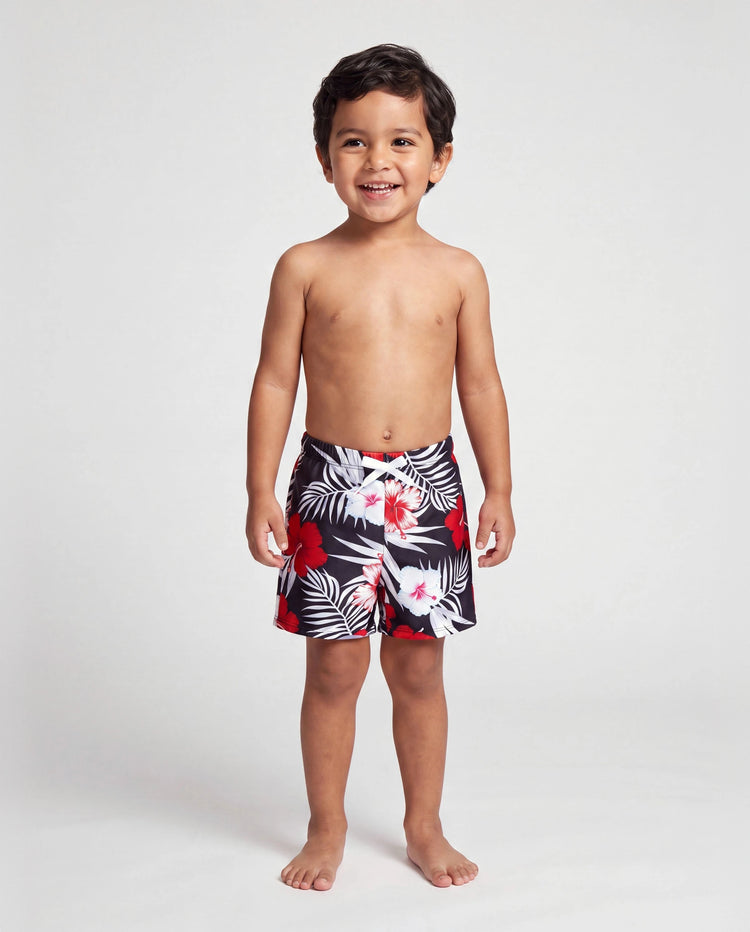 Bañador corto para niño pequeño con estampado floral tropical en negro