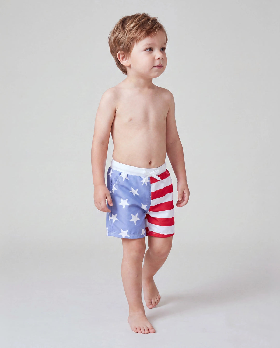 Bañador corto para niño pequeño patriótico del Día de la Independencia 4 de julio con estrellas y rayas en azul
