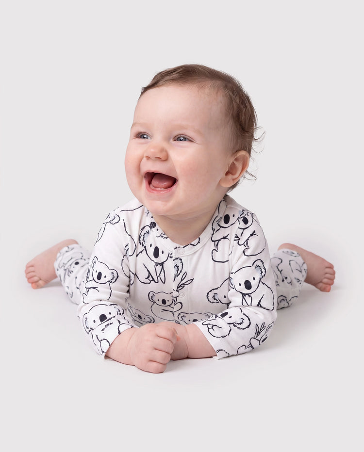Combinaison bébé garçon à manches longues et boutons motif panda blanc