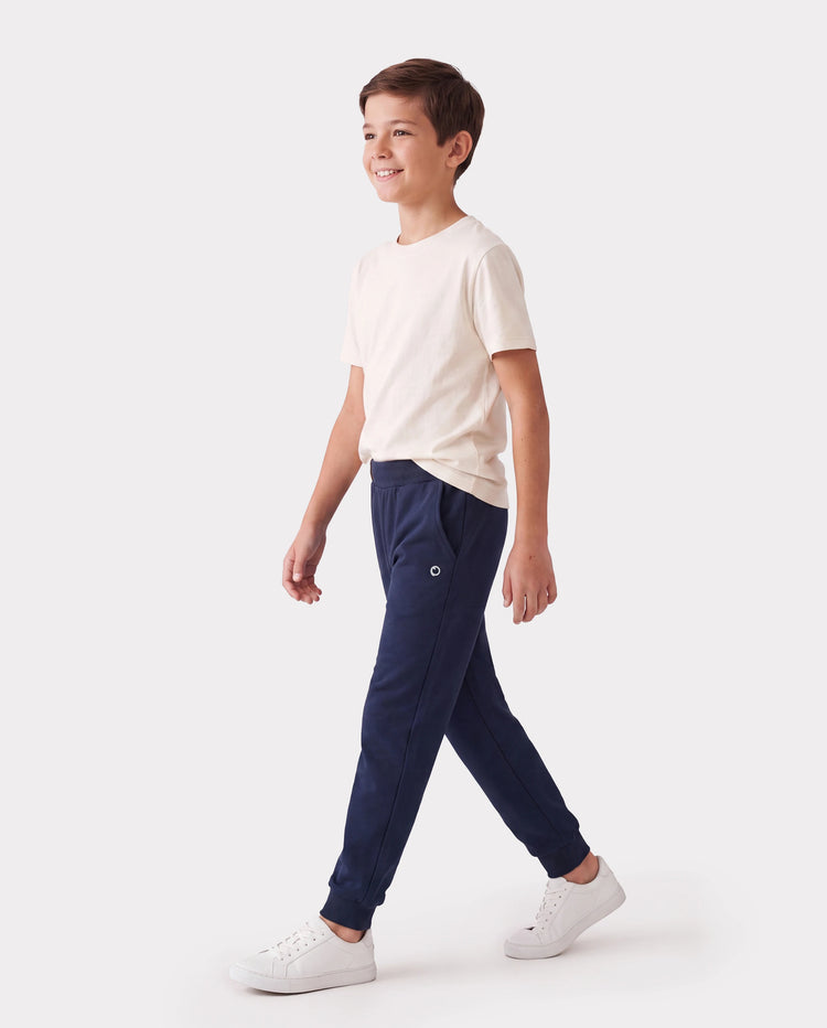 Pantalones deportivos para niños con forro polar, estampado reflectante y bolsillos, cálidos, transpirables y que absorben la humedad, para niños y niñas, color azul oscuro.