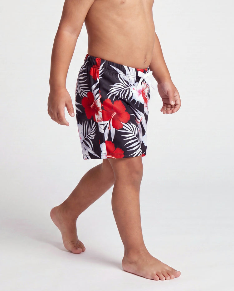 Bañador corto para niño pequeño con estampado floral tropical en negro