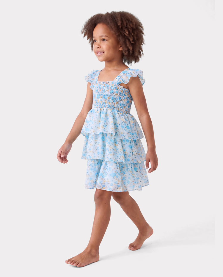 Vestido azul sin mangas con volantes y estampado floral para niña pequeña