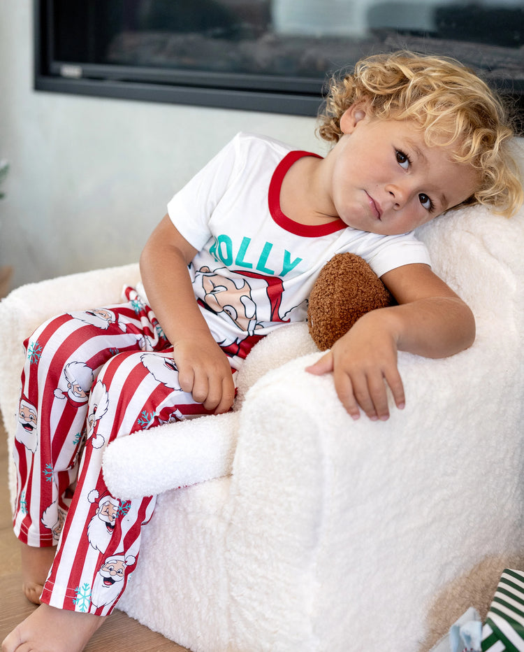 Conjunto de pijama familiar navideño a juego con Papá Noel y copos de nieve, rayas rojas, pijama rojo