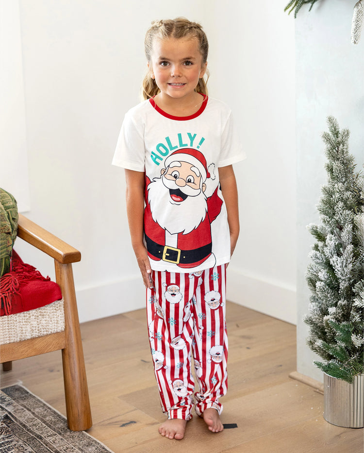 Conjunto de pijama familiar navideño a juego con Papá Noel y copos de nieve, rayas rojas, pijama rojo