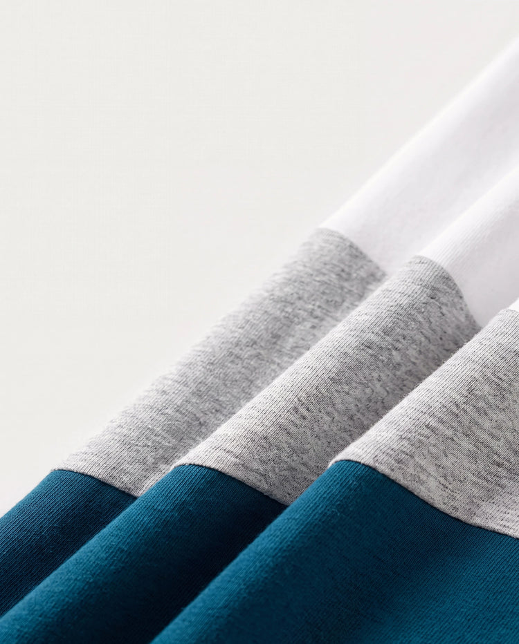 Vestidos con escote en V sólido y mangas de volantes combinados con estampado floral y conjuntos de camisetas de manga corta a bloques de color para papá e hija Azul celeste