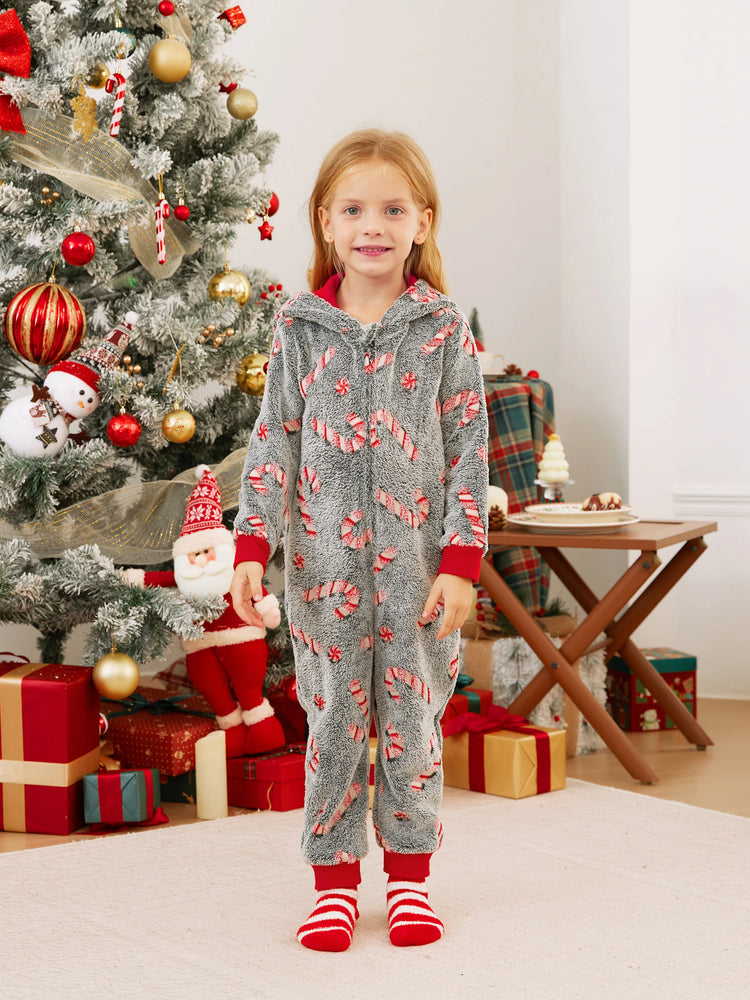 Pyjama grenouillère assorti aux tenues de Noël, motif canne à sucre (brille dans le noir) avec chaussettes de Noël noires