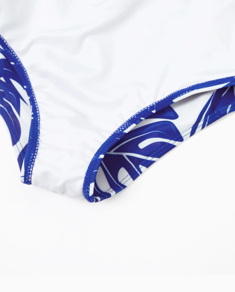 Bañador de una pieza para niña pequeña con estampado de hojas tropicales, tirantes cruzados y recorte Azul
