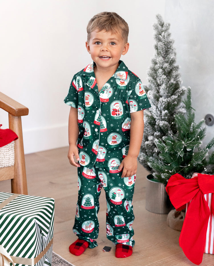 Conjunto de pijama familiar navideño a juego con estampado navideño de Papá Noel en turquesa