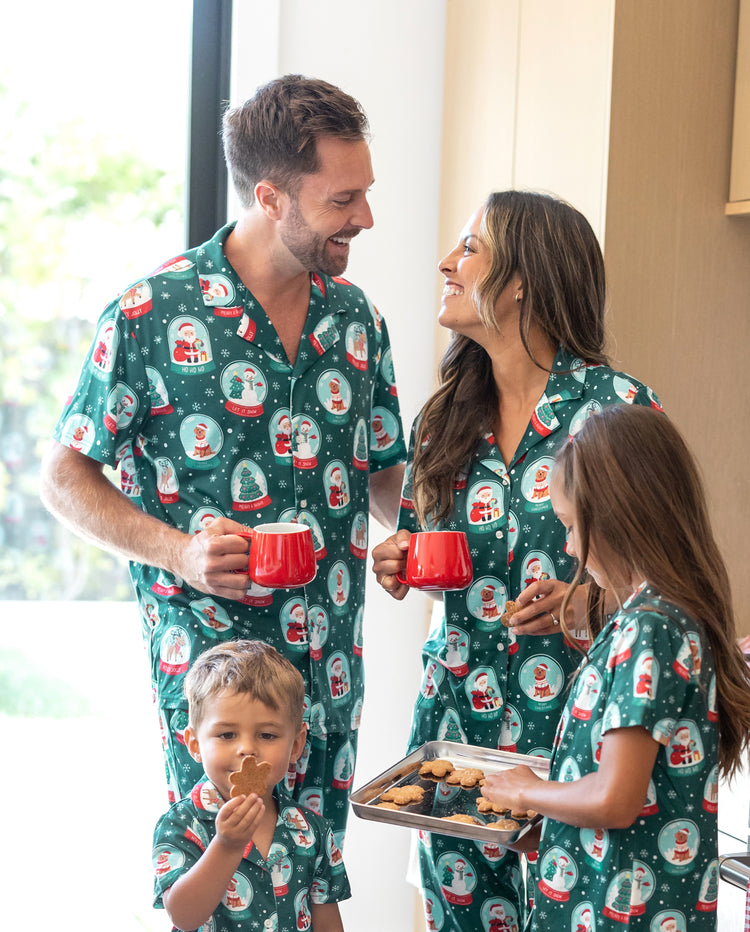 Conjunto de pijama familiar navideño a juego con estampado navideño de Papá Noel en turquesa