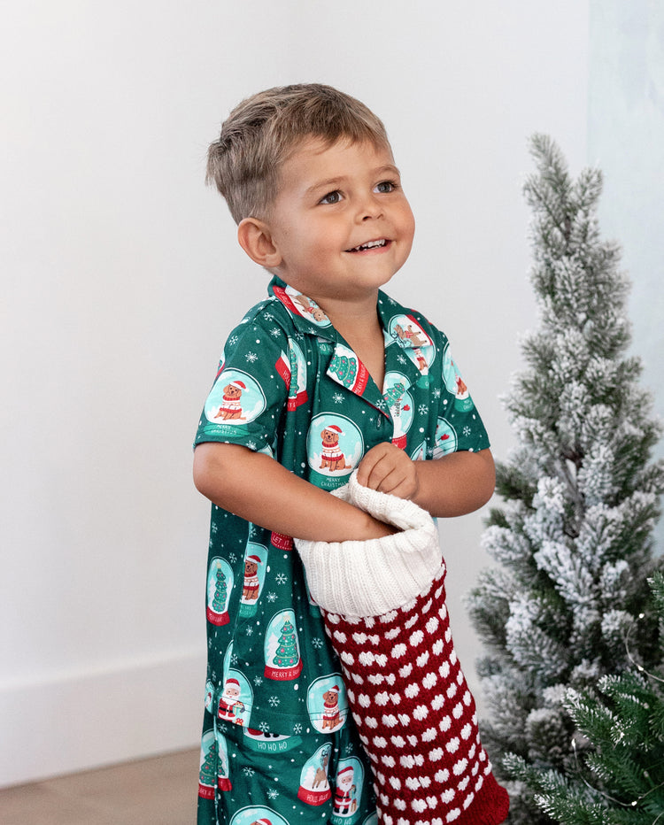 Conjunto de pijama familiar navideño a juego con estampado navideño de Papá Noel en turquesa