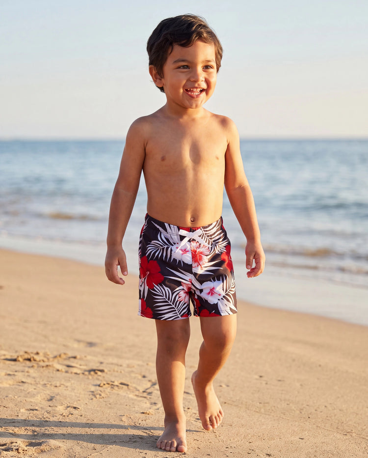 Bañador corto para niño pequeño con estampado floral tropical en negro