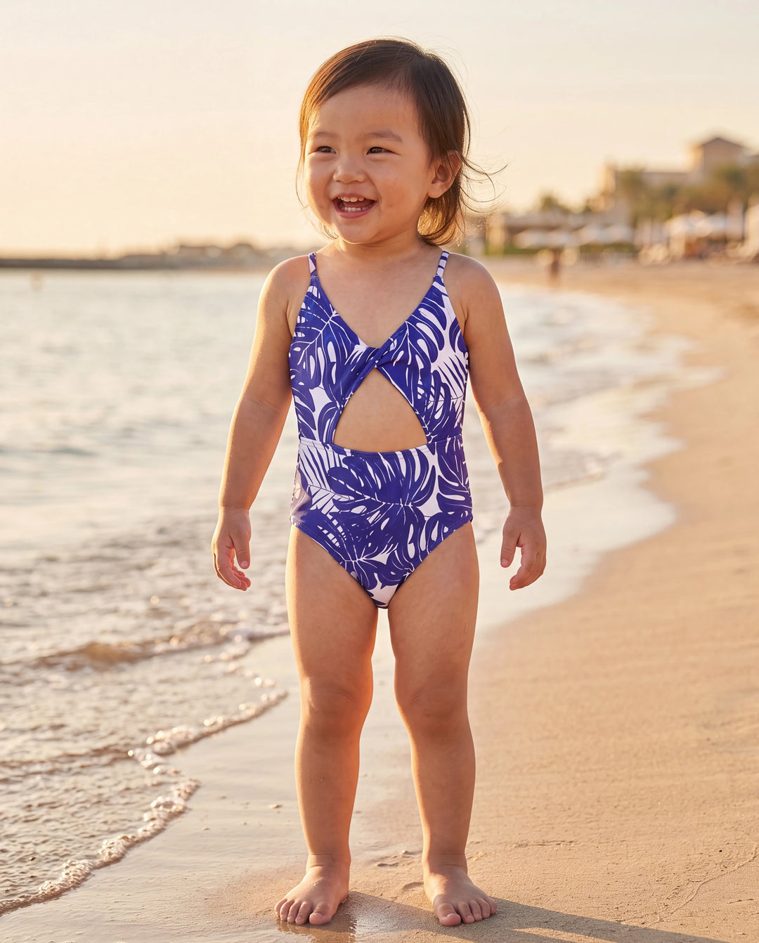 Bañador de una pieza para niña pequeña con estampado de hojas tropicales, tirantes cruzados y recorte Azul