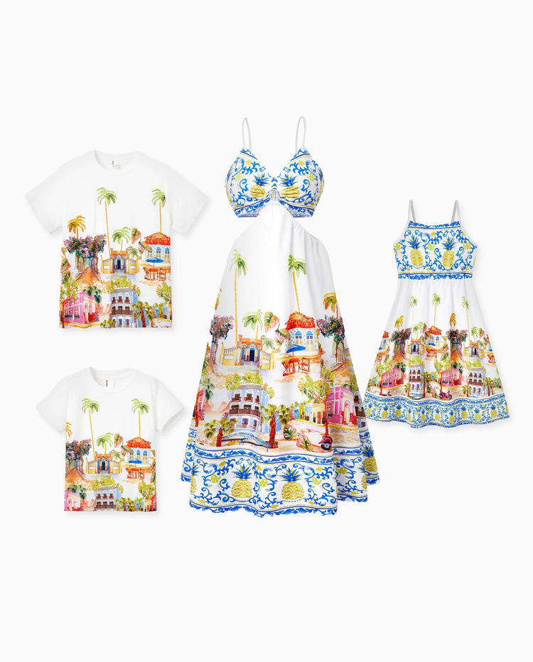 Ensemble de vacances assorti pour la famille T-shirt à manches courtes imprimé tropical ananas et cocotier ou robe à bretelles ajourée pour les vacances d'été blanche