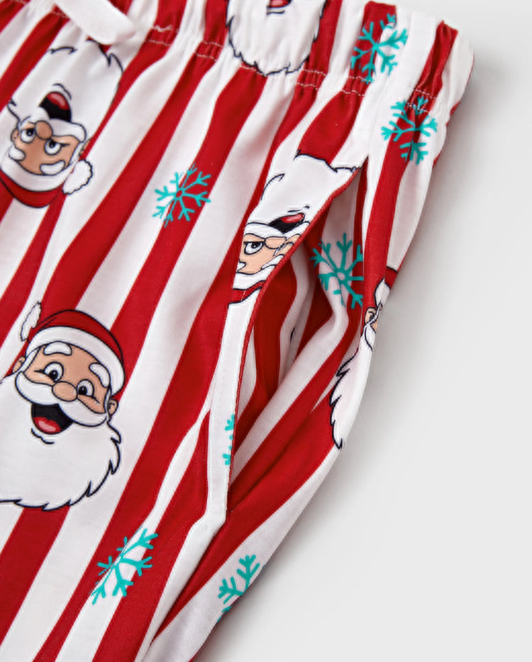 Conjunto de pijama familiar navideño a juego con Papá Noel y copos de nieve, rayas rojas, pijama rojo