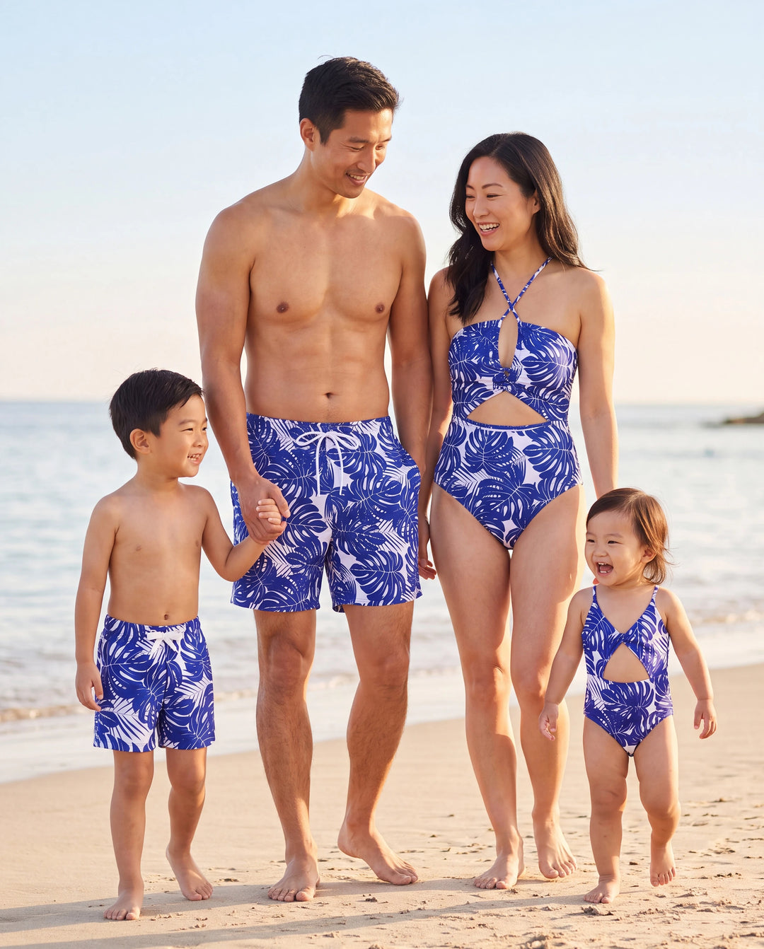 Family Matching Tropical Leaf Print Swim Trunks or Hollow-out Crisscross Straps One-piece Swimsuit Blue