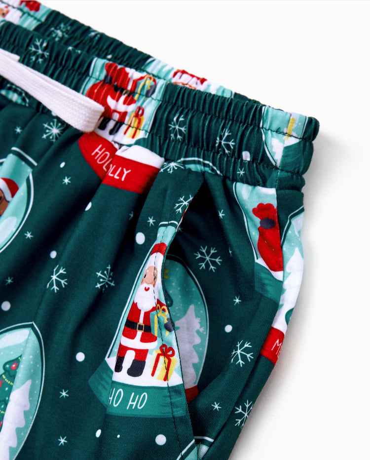 Conjunto de pijama familiar navideño a juego con estampado navideño de Papá Noel en turquesa