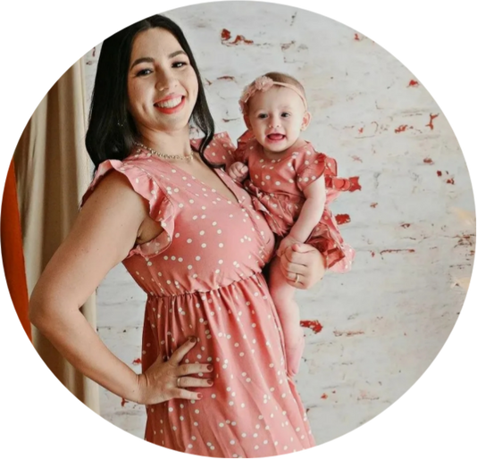 Matching pink dot dresses for baby