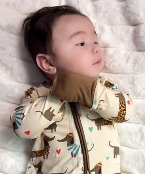 The 2-way zipper is a diaper-change saver, and the stretchy fabric lets him move freely.