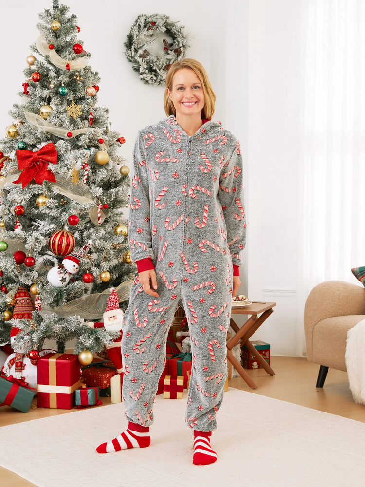 Pyjama grenouillère assorti aux tenues de Noël, motif canne à sucre (brille dans le noir) avec chaussettes de Noël noires