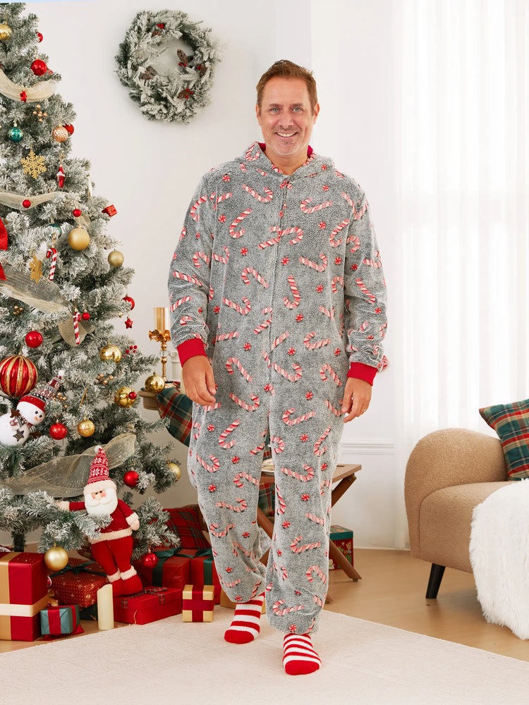 Pyjama grenouillère assorti aux tenues de Noël, motif canne à sucre (brille dans le noir) avec chaussettes de Noël noires