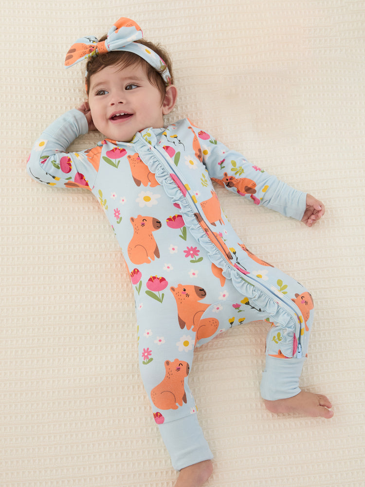 Grenouillère à manches longues et pieds, imprimée animaux, en bambou turquoise, avec fermeture éclair à double sens et bandeau.