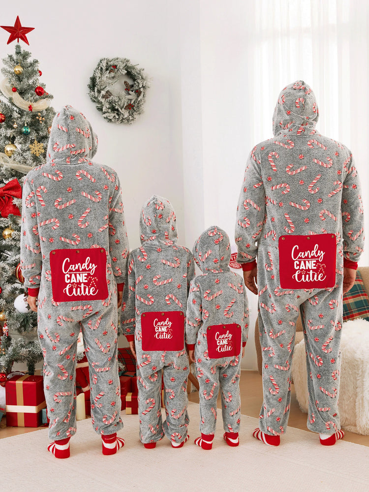 Pyjama grenouillère assorti aux tenues de Noël, motif canne à sucre (brille dans le noir) avec chaussettes de Noël noires