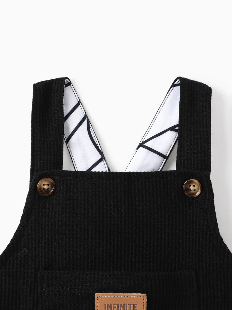 Salopette bébé garçon à imprimé gaufré et poches plaquées sur le devant, noire