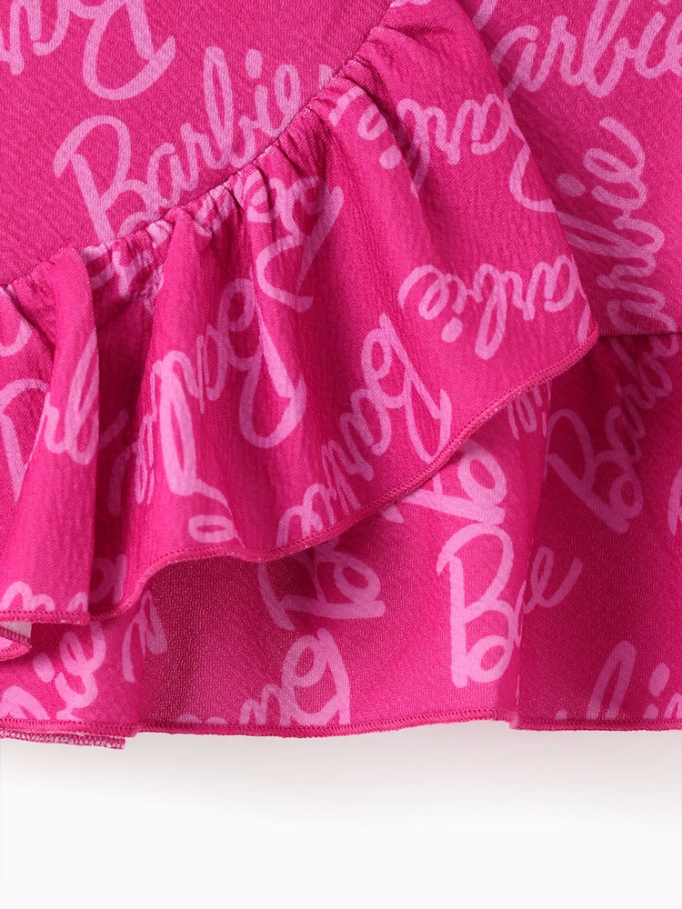 Conjunto de 2 piezas de Barbie para niña pequeña con top con mangas abullonadas y estampado del alfabeto y falda con estampado del logotipo Roseo