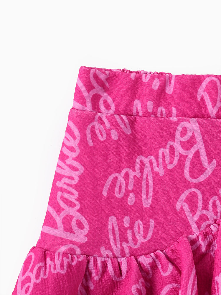 Conjunto de 2 piezas de Barbie para niña pequeña con top con mangas abullonadas y estampado del alfabeto y falda con estampado del logotipo Roseo
