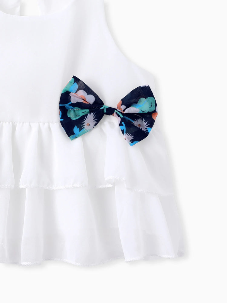 Ensemble 3 pièces pour petite fille avec chapeau décoratif à nœud, débardeur à volants superposés et short à imprimé floral, blanc