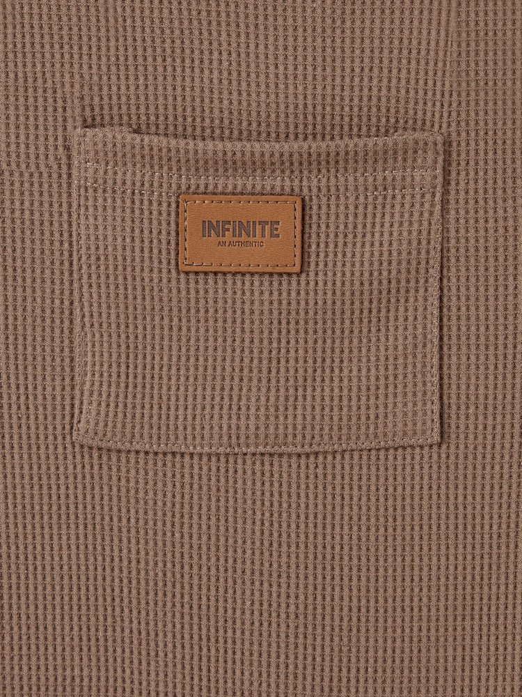 Salopette bébé garçon à imprimé gaufré et poches plaquées sur le devant, kaki