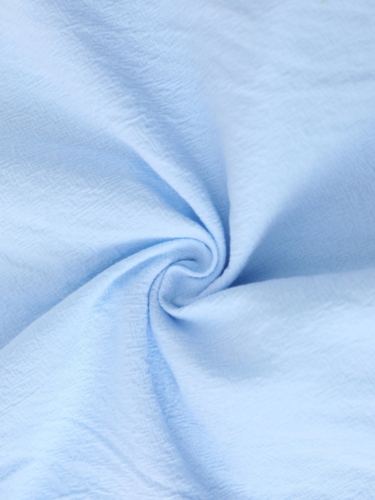 Combinaison bébé garçon 100 % coton avec poches à boutons sur le devant et motif dinosaure, col à revers, couleur unie, bleu