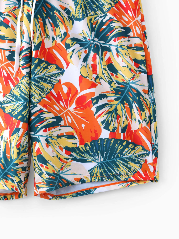 Family Matching Orange and All Over Tropical Plant Print Splicing Ruffle One-Piece Swimsuit and Swim Trunks Shorts Orange color
