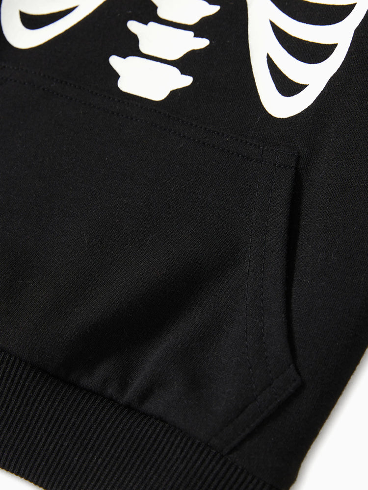 Sweat à capuche à manches longues noir à imprimé squelette phosphorescent pour Halloween, assorti à la famille