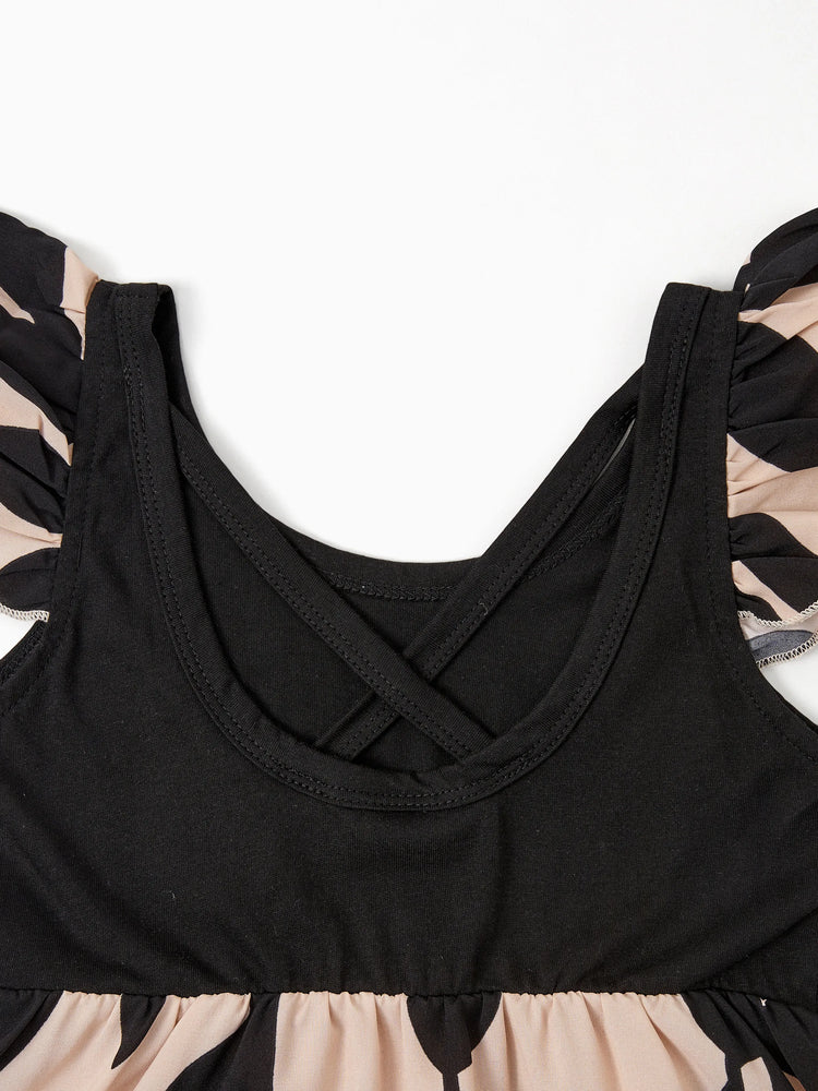 Ensembles assortis pour toute la famille : robe à bretelles florales croisées dans le dos et haut colorblock noir