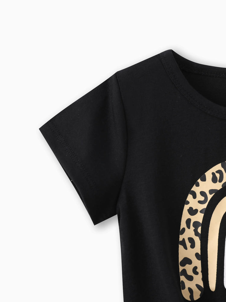 T-shirt à manches courtes et nœud papillon imprimé arc-en-ciel pour petite fille, noir