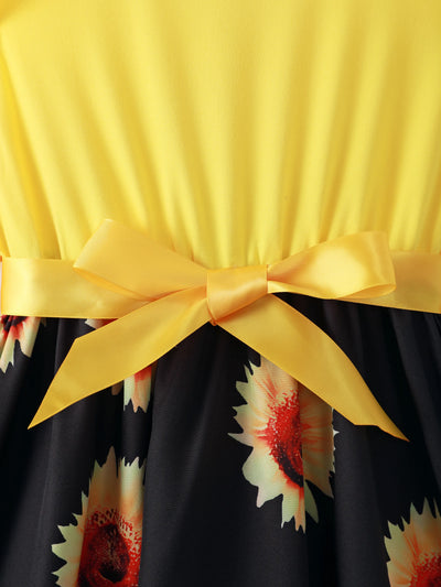 Vestido amarillo con estampado floral y mangas abullonadas con cinturón para niña