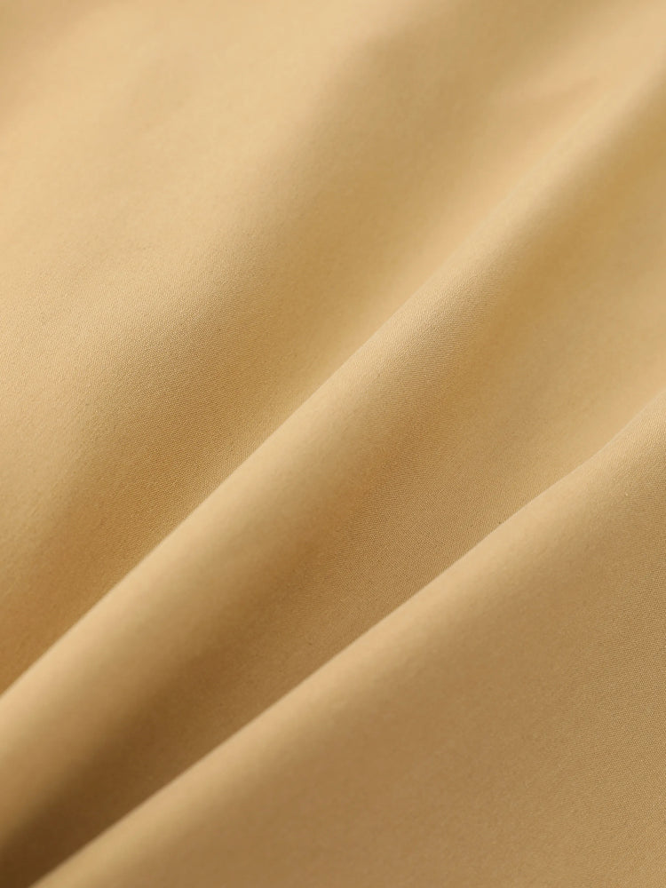 Vestido caqui de manga larga de malla con diseño de lazo y cuello de muñeca para niña pequeña