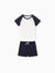 Conjunto de 2 piezas para niño pequeño con camiseta de manga raglán y pantalones cortos de color liso con diseño de gofres en azul oscuro
