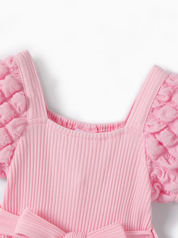 Combinaison bébé fille à manches bouffantes de couleur unie rose