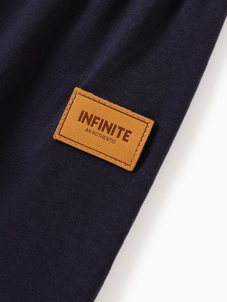 Ensemble 2 pièces pour bébé garçon, sweat à capuche rayé à manches longues et pantalon de survêtement à détails de badges, bleu tibétain