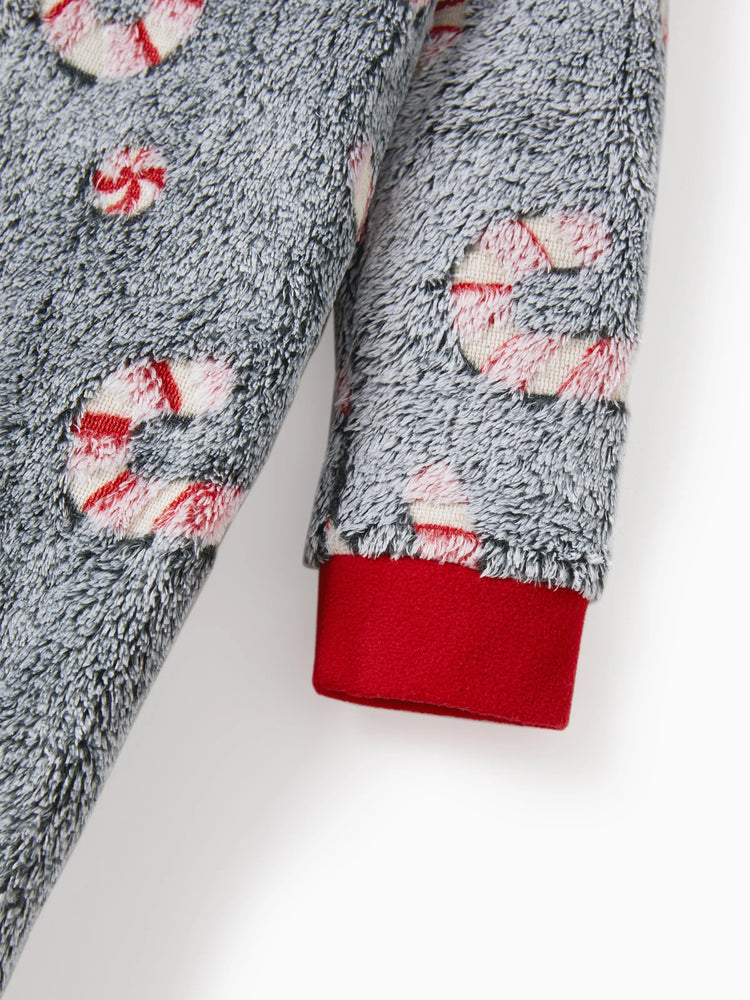 Pyjama grenouillère assorti aux tenues de Noël, motif canne à sucre (brille dans le noir) avec chaussettes de Noël noires